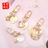 Llavero con Forma de Corazón de Concha de Perla Creativo Llavero de Concha Caracola Pequeño Regalo Ins Colgante Pequeño