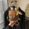 Bolso pequeño super moderno y elegante para mujer 2026, bolso redondo pequeño con un toque de alta gama, nuevo bolso de hombro y cruzado de nicho de Instagram