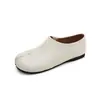 Sapatos Rasos Vintage de Bico Diviso Hoof de Porco Boca Profunda para Mulheres Primavera 2026 Mules de Couro