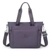 Bolsa tote de nylon de grande capacidade para mulheres, novo estilo 2026, bolsa de ombro leve e à prova d'água em tecido Oxford, adequada para o dia a dia, pode ser carregada na mão ou usada na transversal