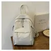 Mochila ultraligera, modelo nuevo 2026, mochila de lona de nailon de alta gama para nicho, para el trabajo, los desplazamientos y los viajes, pequeña y ligera