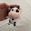 Lindo peluche de becerro animal muñeca colgante puesto venta al por mayor llavero de vaca colgante de felpa lote mixto