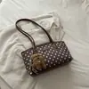 Bolsa feminina elegante e moderna da nova coleção 2026, versátil para o trabalho, bolsa de ombro, design de bolinhas, bolsa de antebraço