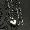 Collar Colgante de Corazón Roto y Lápida de Plata Tailandesa Retro Tendencia Estilo Nicho Europeo y Americano Alto Gama Otoño e Invierno
