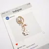 Nuevo Colgante Llavero de Metal Flor de Cerezo Simple Corazón Femenino Flor Decoración para Teléfono Móvil Accesorios Colgantes para Bolsa