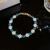 Pulseira de Ouro Real 18k Banhada com Flor de Zircônia e Fivela Redonda Pulseira de Luxo Leve com Toque de Alto Padrão Joia de Mão Exquisita e Fashionável para Mulheres