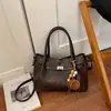 Moda coreana Elegante Chic Sencillo para ir al trabajo Otoño 2026 Nueva Llegada Personalidad Bolso de Hombro Cruzado de Mano para Mujer