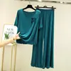 Traje de verano con diseño irregular, nueva camiseta con volantes y lazo, pantalones casuales de pierna ancha de nicho para mujer, cuello redondo, manga media