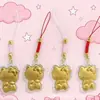 Colgante de cadena para teléfono Hello Kitty bañado en oro, lindo regalo de dibujos animados para niñas, llavero de lujo ligero con decoración de hilo rojo