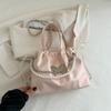 Bolso pequeño para mujer, novedad de 2024, estilo casual, tipo mariposa, bandolera de hombro, con textura, con cadena de perlas.