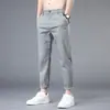 Calça Casual de Seda de Gelo Transfronteiriça Masculina Verão Estilo Fino Esportiva Calça de Terno Pequena para Meninos Calça Reta Solta Masculina de Nove Pontos