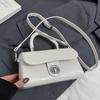 Bolsa cuadrada pequeña portátil de estilo coreano de alta gama, temperamento simple, nueva para primavera y verano, moda casual, todo-partido, bandolera de PU para mujer