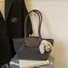 Bolsa de Hombro Versátil Simple de Moda Commuter Transfronteriza 2026 Invierno Nueva Tendencia para Mujer Gran Capacidad