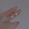 Pendientes de circonita rosa estrella para mujer, ligeros, de lujo, con diseño de nicho, con destellos de estrella de cinco puntas y diamantes, en forma de corazón, de moda.
