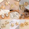 Pendientes Metálicos de Moda Creativa Estilo Ins Calados Corazón Estéreo Forma Geométrica Pétalos Estrella de Cinco Puntas Pendientes de Estilo Simple para Mujer
