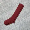 Nuevos calcetines de lana de becerro Maillard suaves y cálidos de color puro estilo preppy adelgazantes largos para mujer