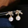 Accesorios DIY aretes de botón de perla dulce elegantes de plata de ley S925 con colgante de lazo engaste de plata 7-12 mm