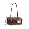 Bolsa Pequena Retro Texturizada de Luxo para Mulheres 2025 Novo Modelo Versátil Bolsa de Ombro para o Dia a Dia Bolsa de Mão Fashion Bolsa Baguette