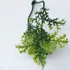 Plantas artificiais, folhagens e samambaias