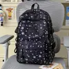 Mochila linda de niña con estrellas estampadas por todas partes, adecuada para estudiantes de secundaria y preparatoria, elegante y ligera
