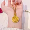 Tienda de oro con joyería de oro brújula de ocho tesoros giratoria collar largo no se desvanece giratorio colgante de loto cadena para suéter