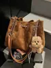 Bolso de Cadena Retro de Aspecto Elevado para Mujer 2025 Nuevo Bolso Cubo de Gamuza Gran Capacidad Bolso de Hombro Único para Mujer