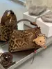Bolsa pequena versátil retrô de comércio exterior para mulheres, nova coleção outono/inverno 2026, bolsa de alta qualidade com estampa de leopardo, bolsa de ombro e bolsa transversal da moda