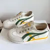 Tênis Feminino da Moda 2026 Novo Estilo Slip-On Respirável Lona Calçados Femininos Planos Versáteis Corrida Esportes Treino Alemão