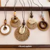 Nuevo collar colgante retro de ratán estilo chino para mujer, estilo bohemio, cadena de suéter de nicho de verano, accesorio de moda y versátil