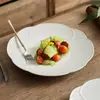 Fábrica Dehua Plato Plano Cerámico Forma de Pétalo Plato para Filete Uso Doméstico Gama Alta Plato Occidental para Ensalada Modelo Nuevo 2026