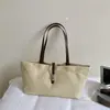 Bolsa de lona simple y espaciosa para mujer, nuevo estilo 2026, ligera, versátil, adecuada para ir al trabajo, bolso de hombro casual y bolso de mano