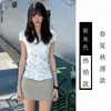 Falda de alta gama gris tipo piel de tiburón que se ajusta a la cadera para mujer, estilo fino de primavera y verano, de cintura alta, adelgazante, falda de línea A, chica sexy, falda midi, minifalda