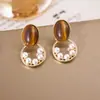 Pendientes de Trébol de Cuatro Hojas Maillard de Aguja de Plata Estilo Hong Kong Retro Elegantes Pendientes para el Trabajo Moda Femenina Lujo Ligero Pendientes de Gama Alta