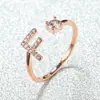 Anillo con Letra de Oro Rosa Nuevo de Amazon Transfronterizo Anillo Abierto con Diamante Blanco Joyería de Mano Anillo Único Personalizado Venta al por Mayor
