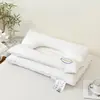 2026 Nuevo Modelo Algodón Puro Dos en Uno Almohada de Tracción Almohada Multifuncional de Soporte para el Cuello Masaje Confort Almohada Spa Hotel