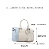 2026 Novo Modelo Couro Bovino de Primeira Camada Textura Simples de Alto Padrão Bolsa de Mão de Couro Genuíno Boston Design de Nicho Bolsa Feminina
