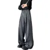 Pantalones negros para hombre con dobladillo curvo, venta al por mayor de fábrica del sudeste asiático transfronteriza, pierna recta para primavera y otoño, diseño fluido, pantalones de alta gama