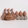 Popular Transfronterizo Set de 12 Piezas Triangular Flocado Esponja de Polvo Suelto Pulgar Cojín de Aire Huevo de Maquillaje Mini Súper Suave y No Absorbe el Polvo