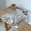 Algodón clase A apto para la piel Conjunto de dos piezas de verano para niños, top de manga corta y shorts, estampado de dibujos animados para bebé, ropa de casa transpirable