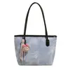 Bestseller transfronterizo: estilo casual, color block, bolsa tote de gran capacidad, bolso de hombro versátil y lindo con relieve para estudiantes