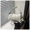 Bolso Cilíndrico de Charol Brillante Modelo Nuevo 2026 Bolso de Mano y Bolso Cruzado Versátil para el Trabajo y los Viajes Bolso de Mujer de Alto Valor Estilo Almohada