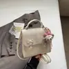 Mochila Estilo Universitario Dulce Estilo Coreano Nueva Verano 2025 Bolso de Mano Pequeño Cuadrado Texturizado de Moda para Mujer