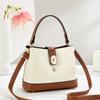 Bolsa Balde para Mulheres 2025 Novo Estilo Splicing Cor Contrastante Bolsa Simples e Popular Bolsa de Mão Ombro Transversal Feminina Moderna