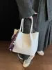 2026 nova bolsa de ombro transversal tote balde feminina de grande capacidade para o dia a dia, transfronteiriça, moderna, simples e elegante