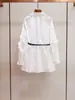 Shenzhen Nanyou roupa feminina de ponta novo design estilo francês lapela orelha de madeira carcela enviesada manga comprida abotoamento simples camisa saia