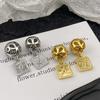 Aretes geométricos cuadrados estilo metal Luojia de lujo ligero diseño hueco aretes de bola redonda otoño e invierno aretes superbrillantes para todo