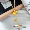 Collar Pequeño de la Fortuna Chapado en Oro Nuevo Estilo Chino Diseño de Lujo Ligero para Mujer Collar con Borla de Moneda Hielo Triturado Calabaza Semi-Cepillada