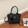 Bolsos Retro Diarios Súper Populares para Mujer 2026 Nuevo Estilo Versión Coreana Textura Versátil Hombro Único Cruzado Moda Bolso de Cubo de Mano