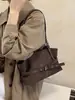 Bolsa Tote Retrô de Nicho Feminina 2026 Nova Bolsa de Ombro de Couro Macio Bolsa de Axila Versátil Bolsa Baguete para o Dia a Dia