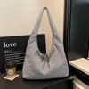Bolsa tote de lona casual estilo japonês 2026 nova tendência de grande capacidade para axila para trabalho e deslocamento bolsa de ombro